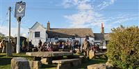 Visit one of the best pubs in Dorset for live music, great drink and its very own Stonehenge...